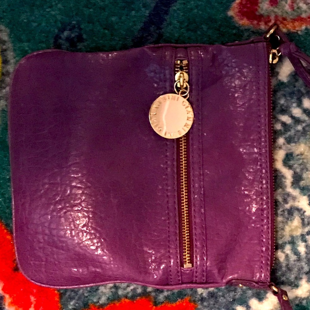 Lightweight purple crossbody purse.